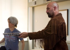 Kevin Gage prepares for scene (production still)