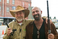 Kevin with the weapons master (production still)